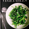 black hardcover cook book. Vegetables 