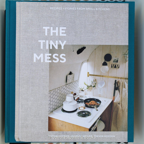 The Tiny Mess Neutral color hardcover coffee table book.