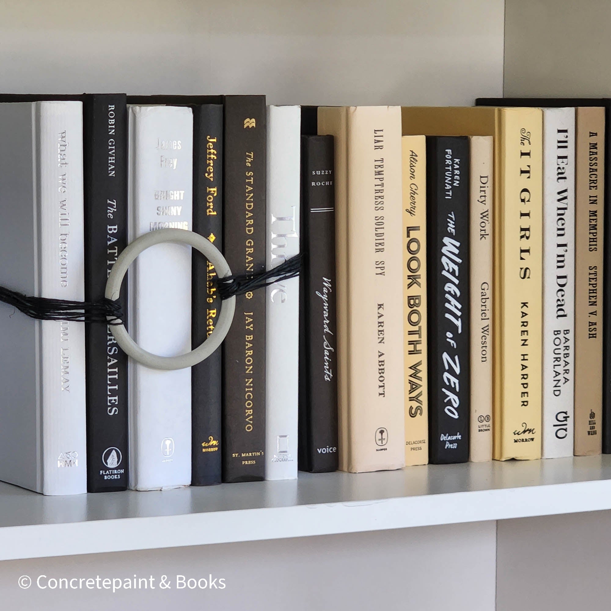 Set of neutral books with black and white font for home display and decoration.