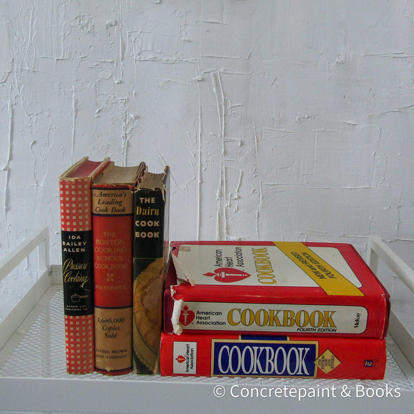 Set of vintage cookbooks in red white and brown.