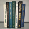 Decorative Book Stackset of authentic hardcver real books used for shelf decor. Book display set in greens, blues, neutrals, and blacks. 