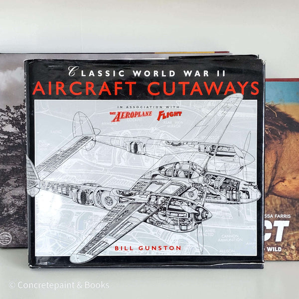 World war two aircraft coffee table book used as men's shelf décor.