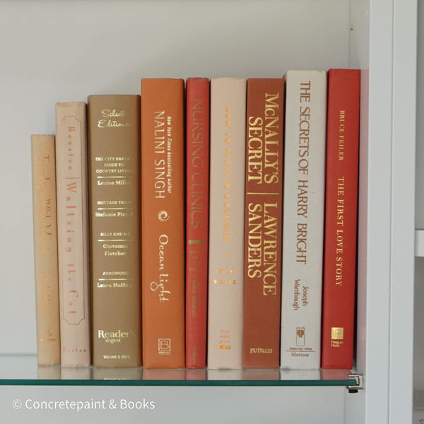 Books for display on shelf. Neutral and warm toned home decor. 